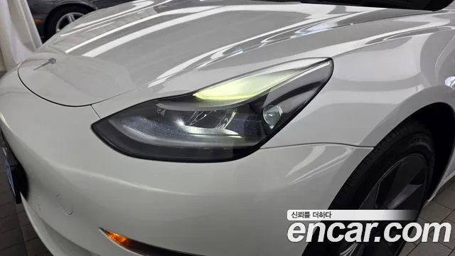 Tesla Model 3 — Фото автомобиля 7
