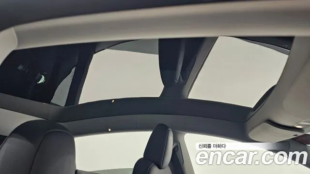 Tesla Model Y — Фото автомобиля 23