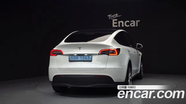 Tesla Model Y — Фото автомобиля 4
