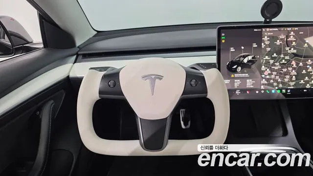 Tesla Model 3 — Фото автомобиля 21