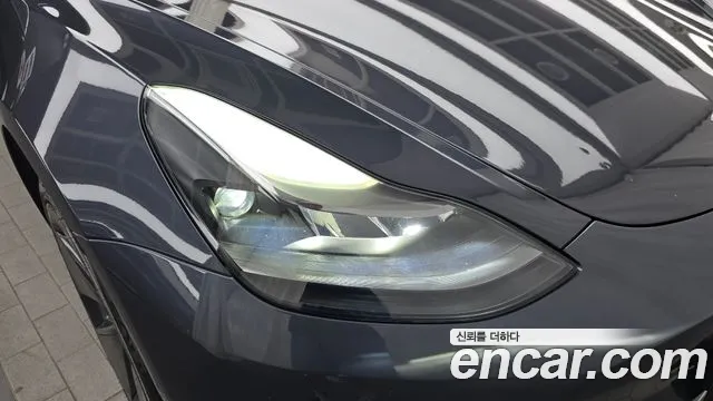 Tesla Model 3 — Фото автомобиля 19