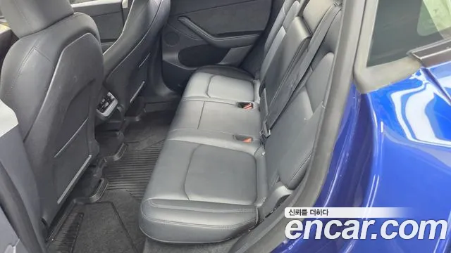 Tesla Model Y — Фото автомобиля 16