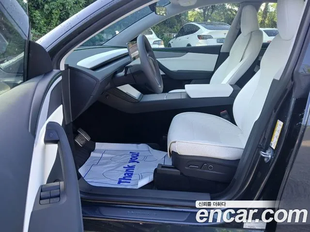 Tesla Model Y — Фото автомобиля 7