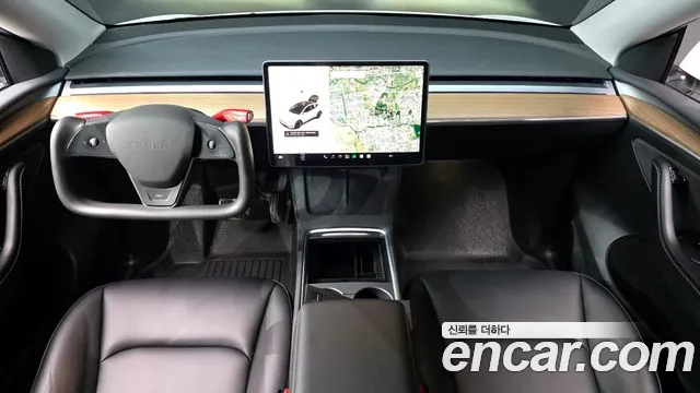 Tesla Model Y — Фото автомобиля 10