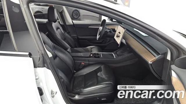 Tesla Model 3 — Фото автомобиля 14