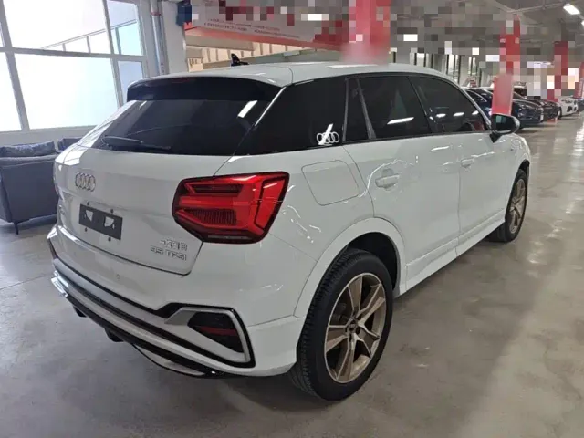 Audi Q2L — Фото автомобиля 6