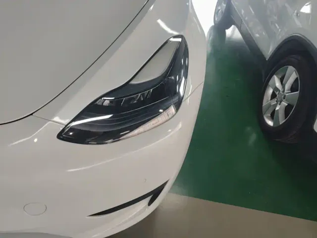 Tesla Model Y — Фото автомобиля 23