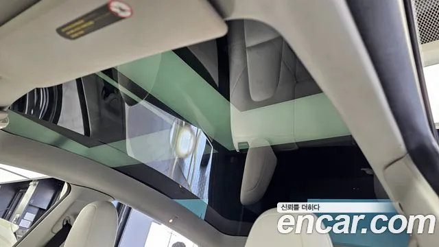 Tesla Model Y — Фото автомобиля 19