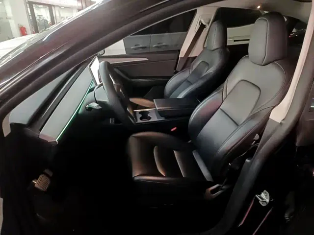 Tesla Model Y — Фото автомобиля 14