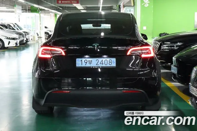 Tesla Model Y — Фото автомобиля 4