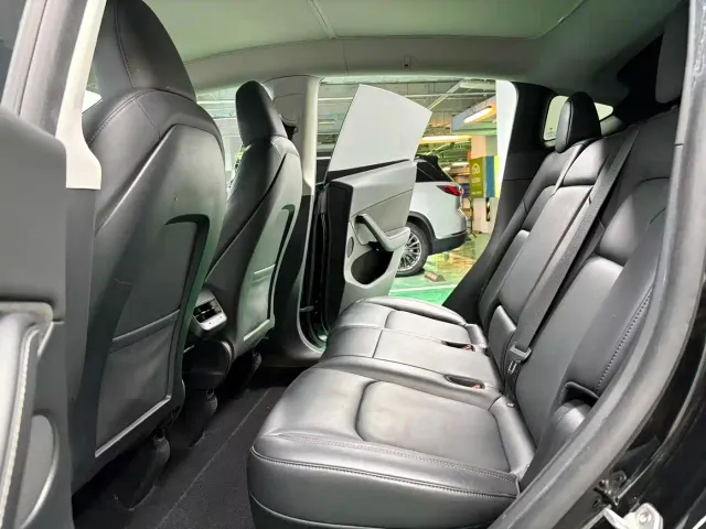 Tesla Model Y — Фото автомобиля 7
