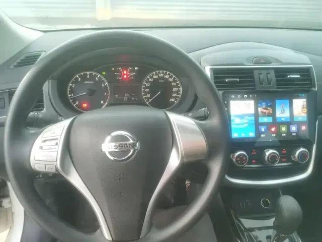 Nissan Tiida — Фото автомобиля 4