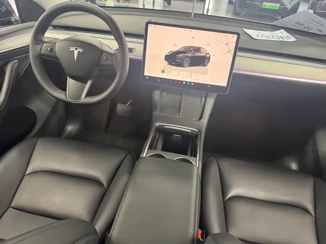 Tesla Model Y — Фото автомобиля 6