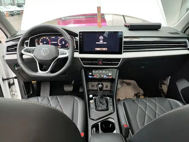 Volkswagen Tiguan L — Фото автомобиля 9
