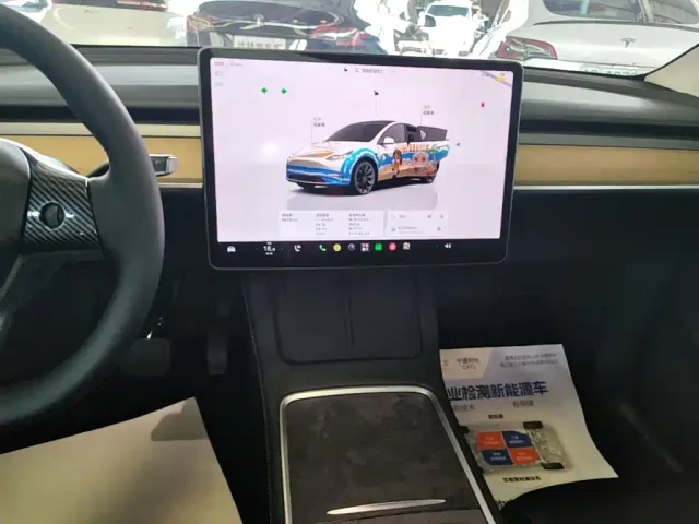 Tesla Model Y — Фото автомобиля 12
