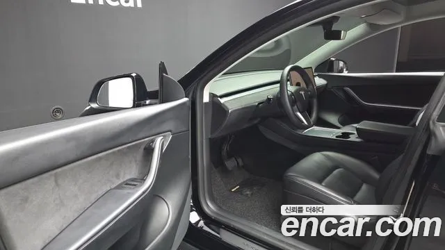 Tesla Model Y — Фото автомобиля 15
