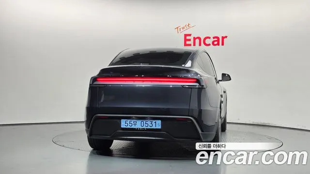 Tesla Model Y — Фото автомобиля 4