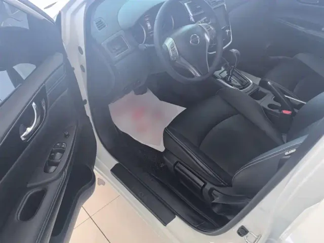 Nissan Tiida — Фото автомобиля 11