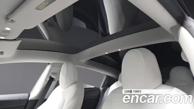 Tesla Model 3 — Фото автомобиля 24