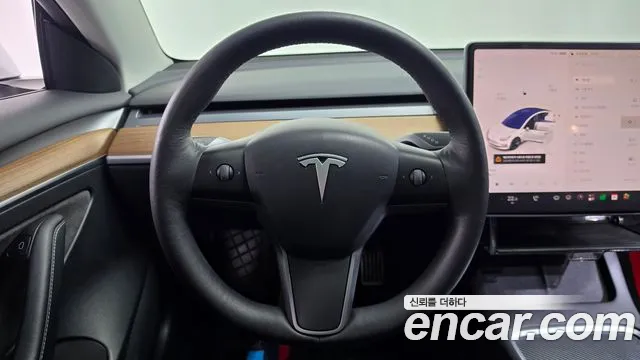 Tesla Model 3 — Фото автомобиля 13