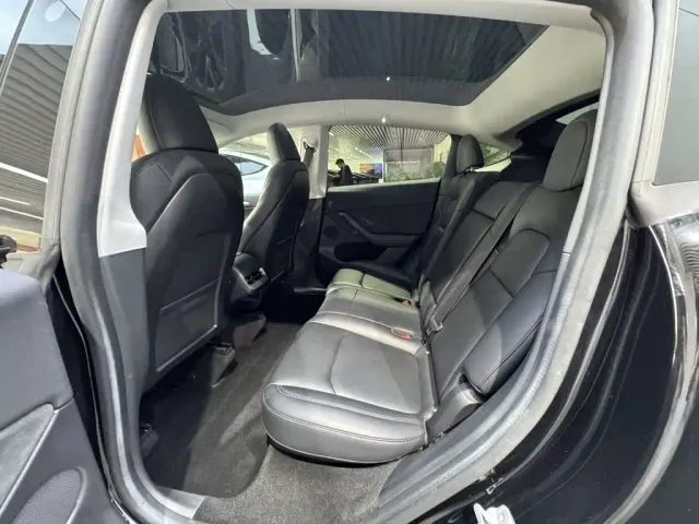 Tesla Model Y — Фото автомобиля 16