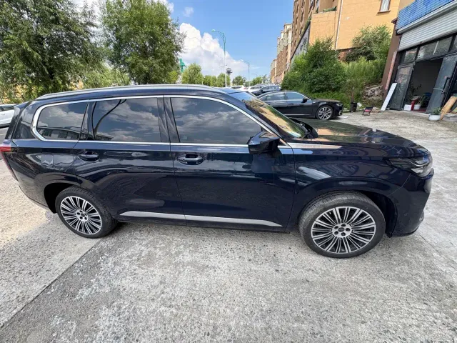 Exeed Landmark C-DM — Фото автомобиля 3