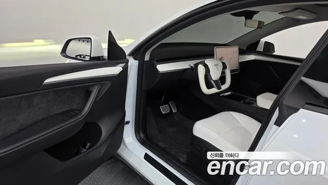 Tesla Model Y — Фото автомобиля 8