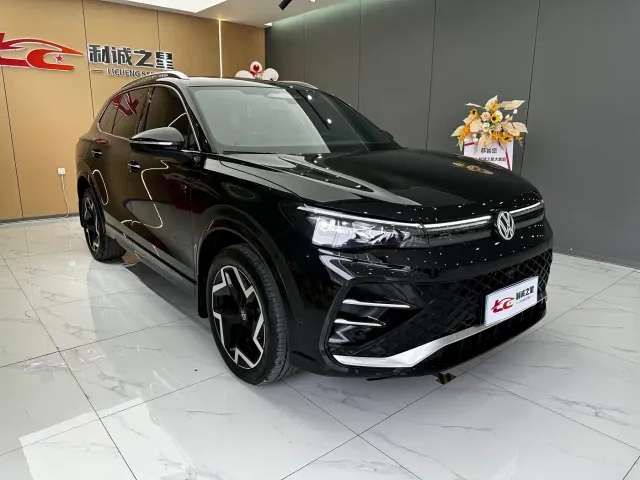 Volkswagen Tiguan L — Фото автомобиля 3