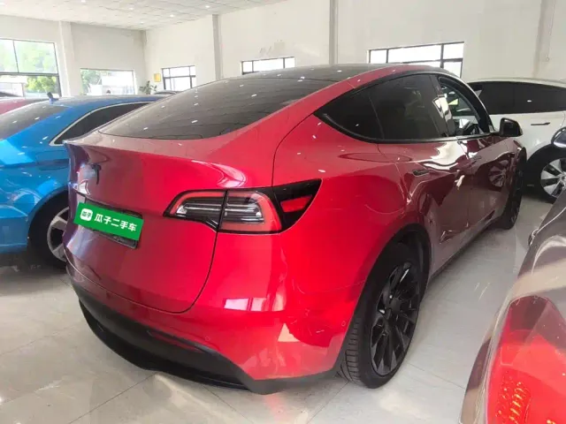 Tesla Model Y — Фото автомобиля 6