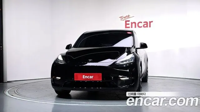 Tesla Model Y — Фото автомобиля 3