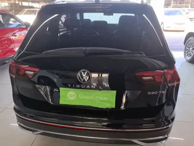 Volkswagen Tiguan L — Фото автомобиля 5