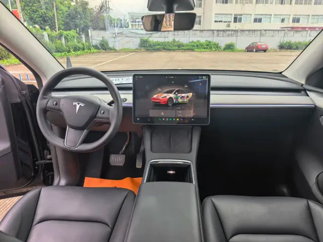 Tesla Model Y — Фото автомобиля 7