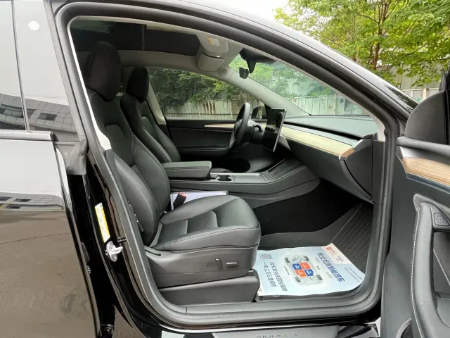 Tesla Model Y — Фото автомобиля 15