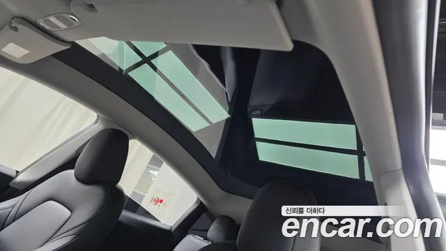 Tesla Model Y — Фото автомобиля 15