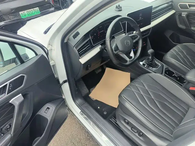 Volkswagen Tiguan L — Фото автомобиля 15