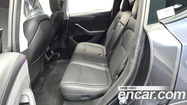 Tesla Model Y — Фото автомобиля 11