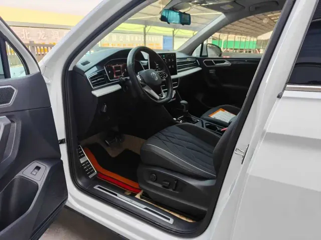 Volkswagen Tiguan L — Фото автомобиля 7
