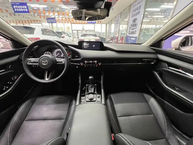 Mazda Axela — Фото автомобиля 9