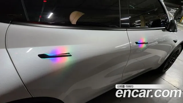 Tesla Model Y — Фото автомобиля 15