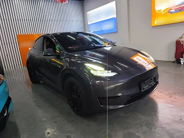 Tesla Model Y — Фото автомобиля 3
