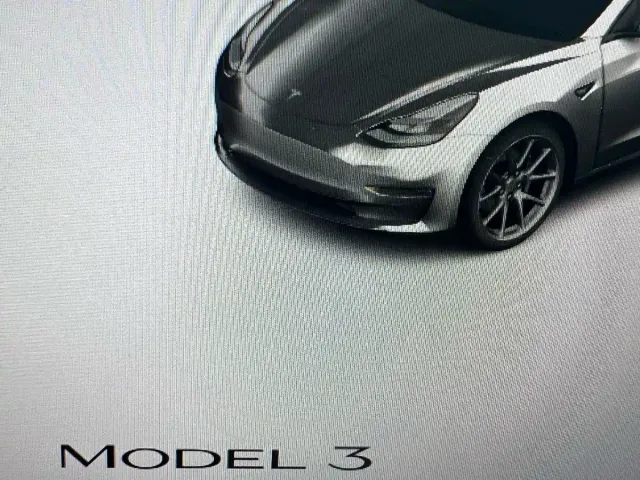 Tesla Model 3 — Фото автомобиля 12