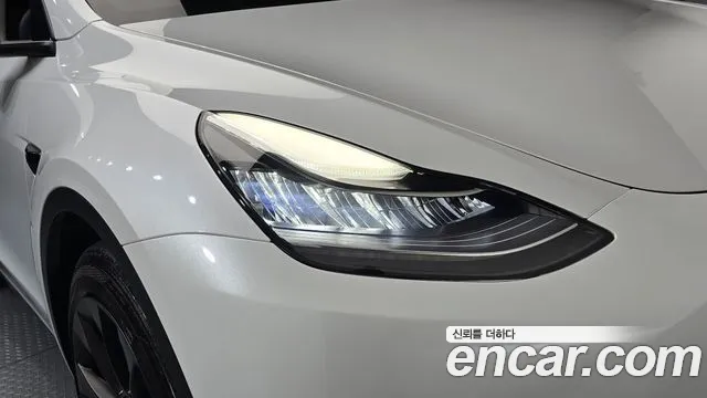 Tesla Model Y — Фото автомобиля 7