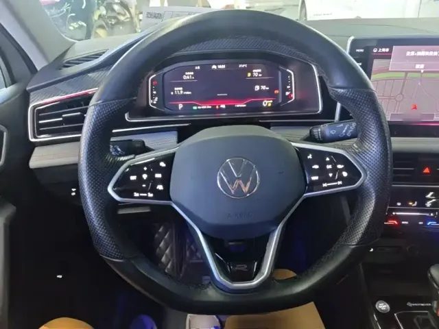 Volkswagen Tiguan L — Фото автомобиля 6