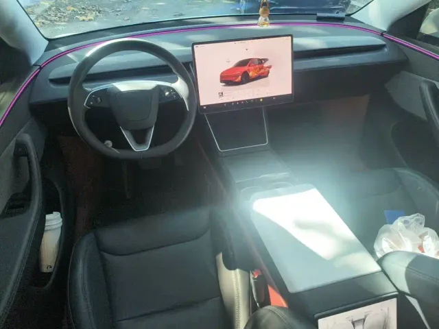 Tesla Model Y — Фото автомобиля 12