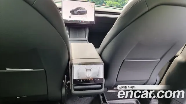 Tesla Model Y — Фото автомобиля 5