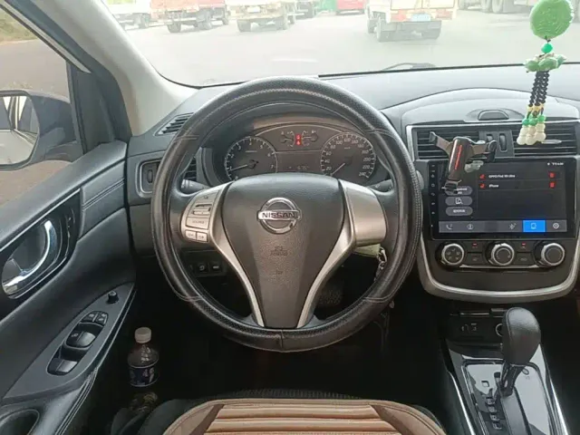 Nissan Tiida — Фото автомобиля 10