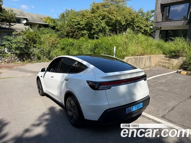 Tesla Model Y — Фото автомобиля 2