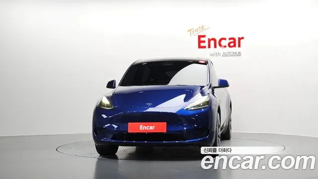 Tesla Model Y — Фото автомобиля 3