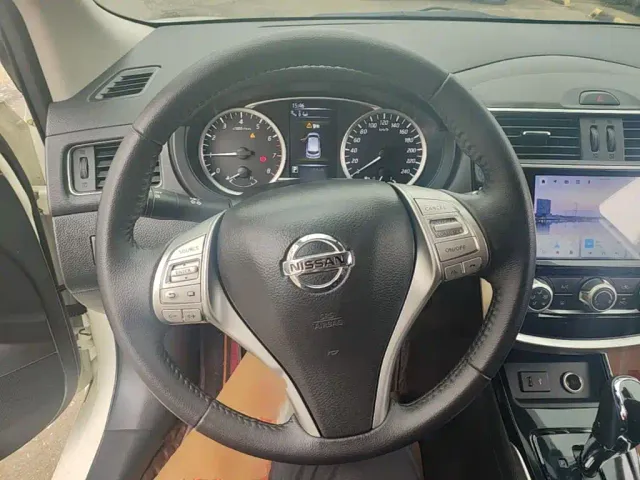 Nissan Tiida — Фото автомобиля 10