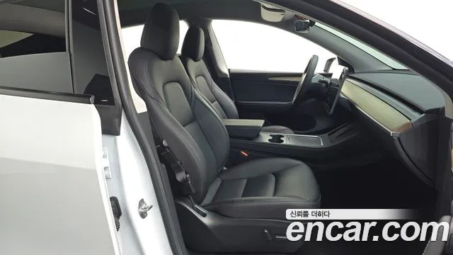 Tesla Model Y — Фото автомобиля 18